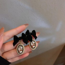 silver autumn diamond Pearl bow earrings retro samll wind temperament ear stud..