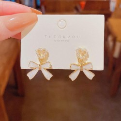 silver Korea enamel bow earrings woman all-Purpose temperament same style love..