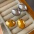 fashion occidental style wind exaggerating Metal surface gold earrings woman pellet Earring samll buckle