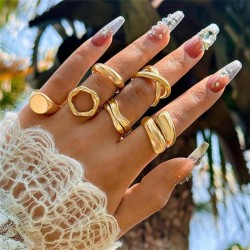   samll trend surface ring  exaggerating geometry surface opening woman