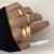   samll trend surface ring  exaggerating geometry surface opening woman