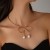 occidental style punk Metal circle bow Collar woman drop imitate Pearl necklace