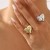 R samll three-dimensional love pattern ring  personality exaggerating Metal textured opening