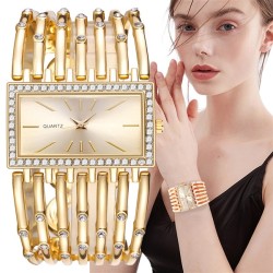 (Gold) stainless steel lady bangle quartz watch  leisure hollow lady wrist-wat..