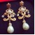 Europe and America exaggerated fashion palace pearl red rose cross earrings Bride Earrings