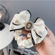 ( Beige) diamond bow ...